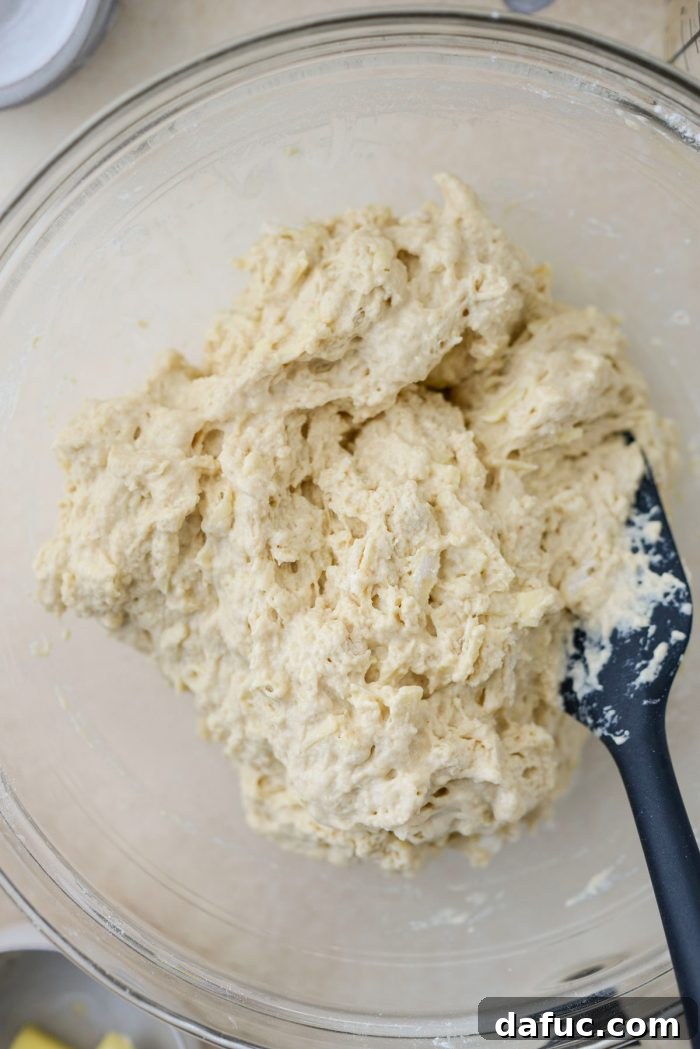 Mixing bread batter until just combined