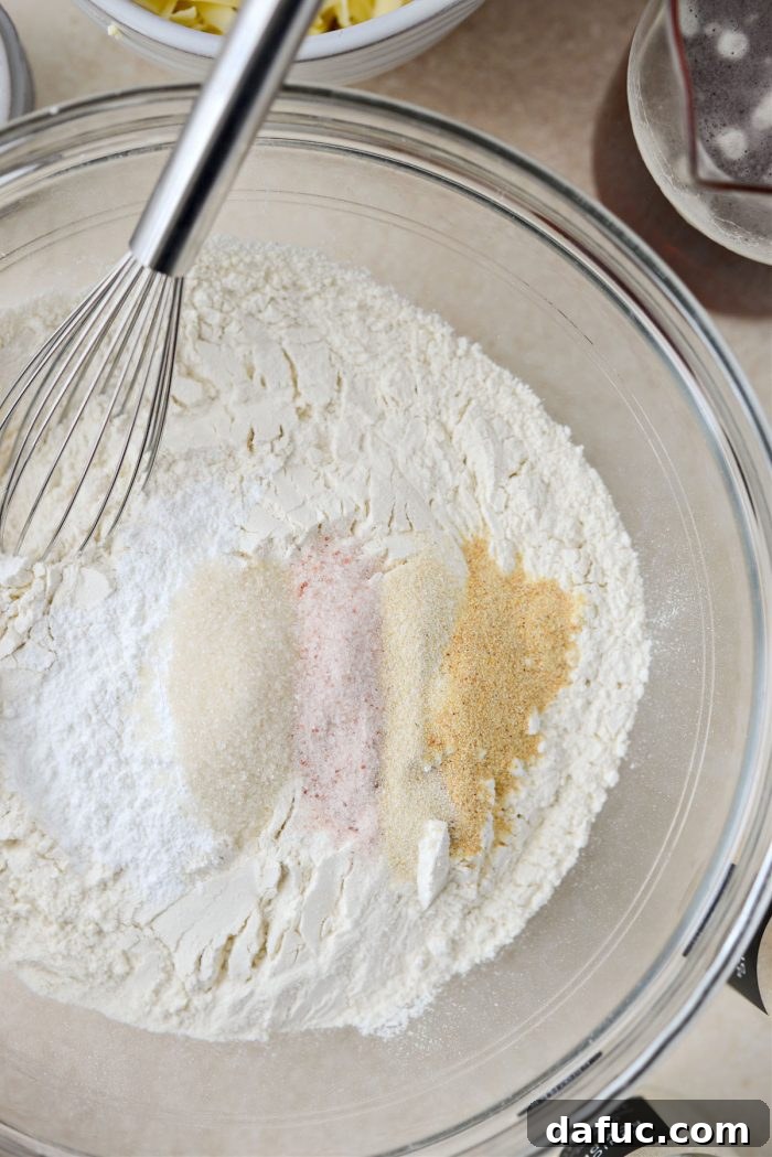 Measuring and adding dry ingredients to a mixing bowl