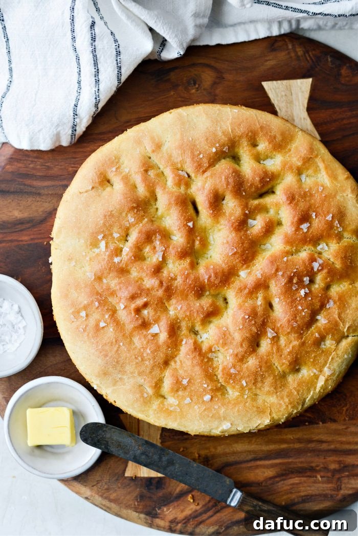 Freshly baked Homemade Focaccia cooling on a wire rack.