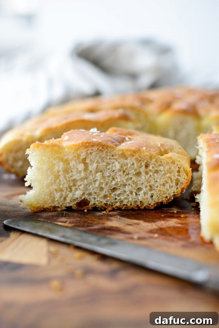 Delicious Homemade Focaccia on a serving board.