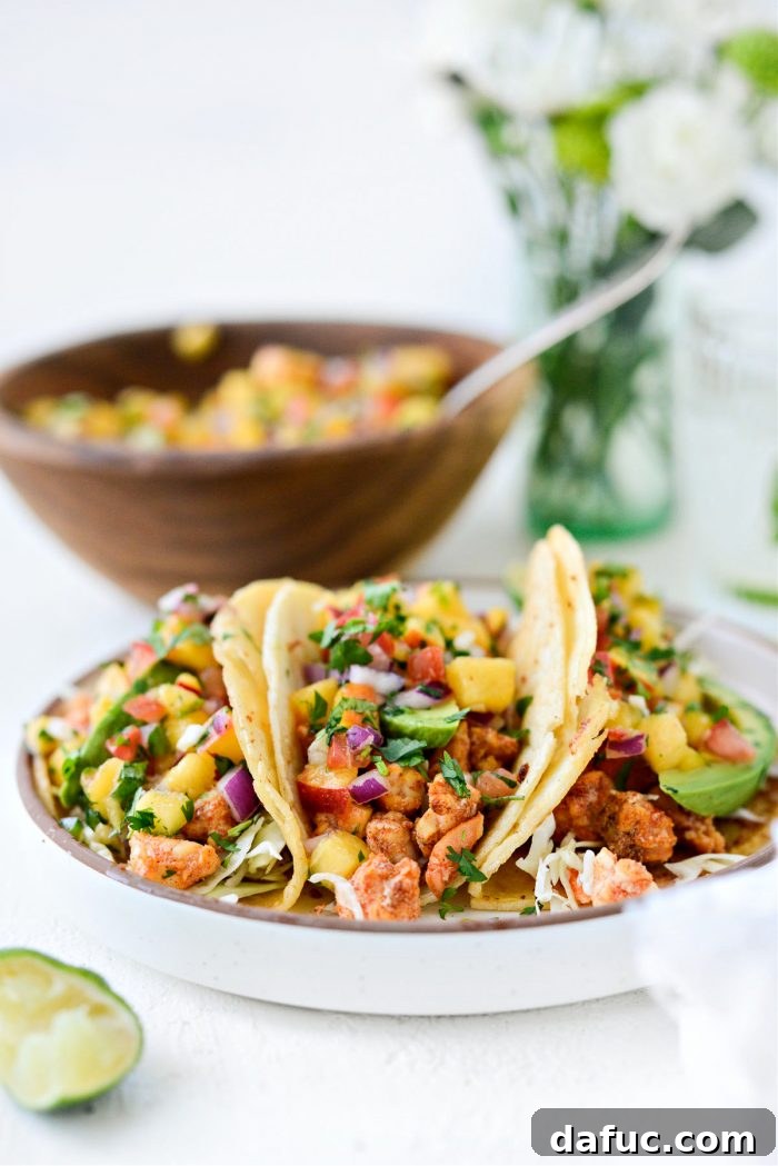 Sunshine Shrimp Tacos 3 Fresh and vibrant Summer Shrimp Tacos arranged on a platter