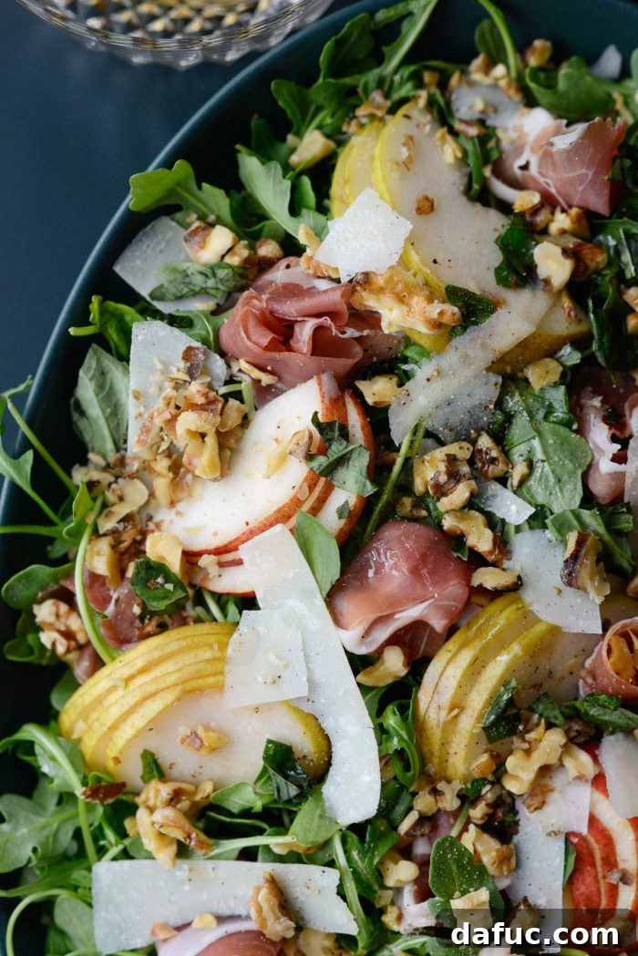 Pear and Prosciutto Arugula Salad presented beautifully