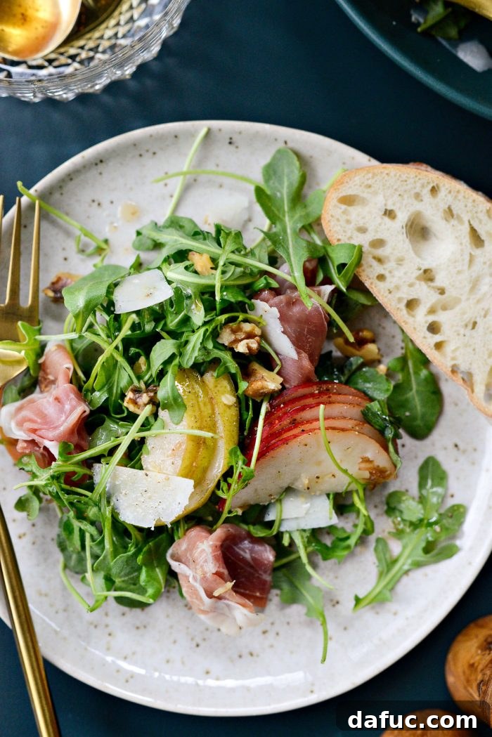A final, mouth-watering image of the Pear and Prosciutto Arugula Salad