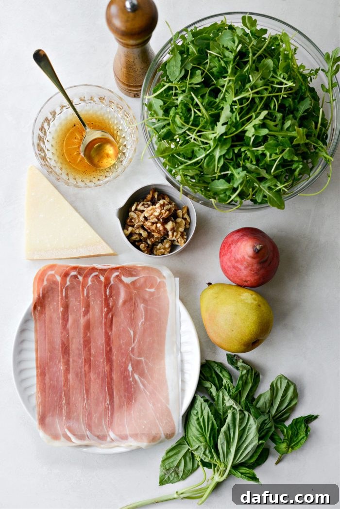 Ingredients laid out for Pear and Prosciutto Arugula Salad