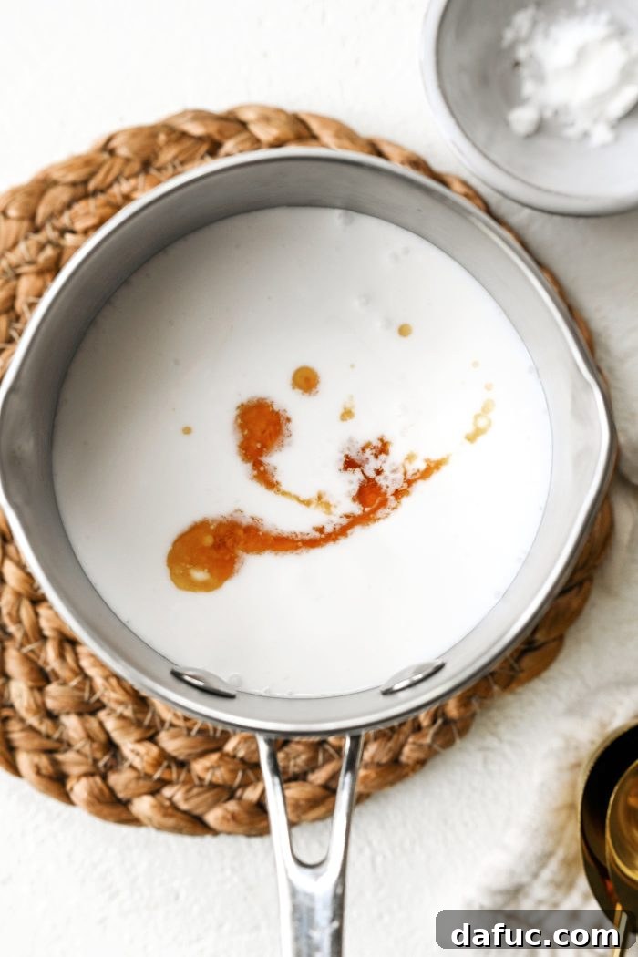 ingredients for coconut maple syrup in saucepan