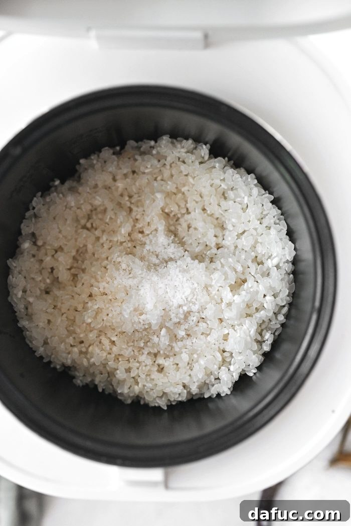 add to rice cooker with salt